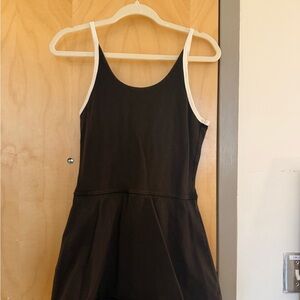 Black Sleeveless Dress with White Trim